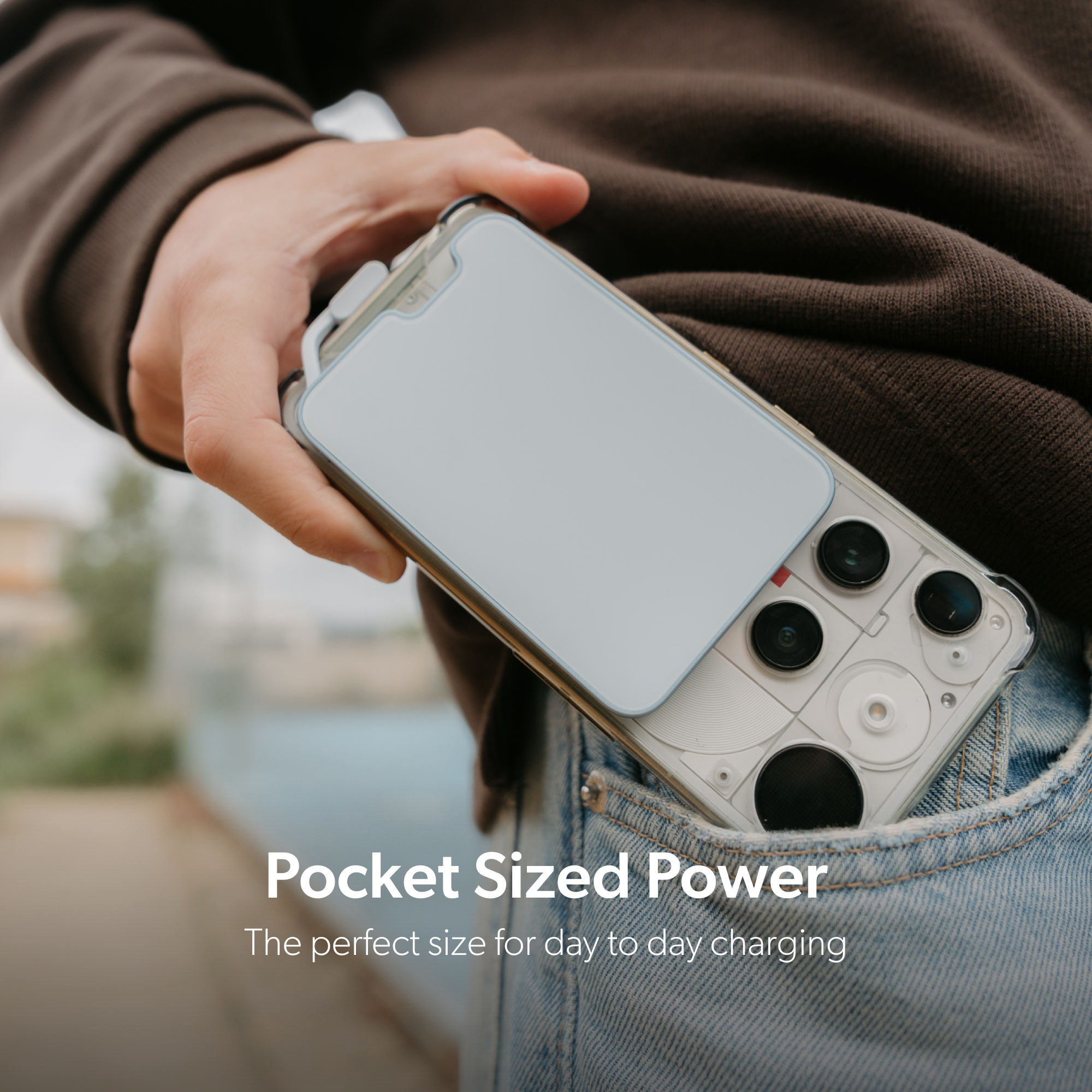 PowerPack Slim 3 attached to a smartphone being placed into a pocket